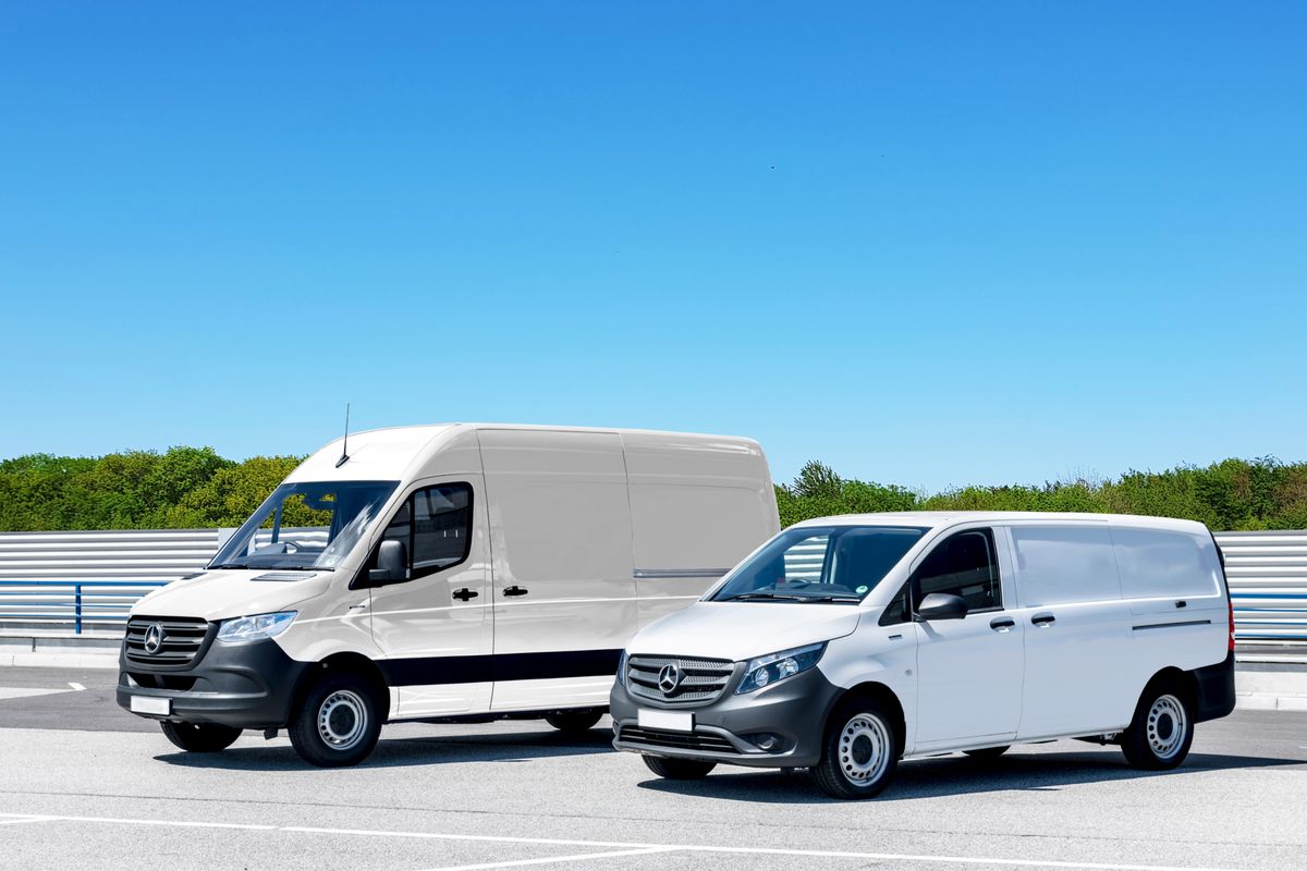 White refrigerated delivery vans lined up ready for overnight dispatch